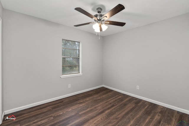 unfurnished room with ceiling fan and dark hardwood / wood-style flooring