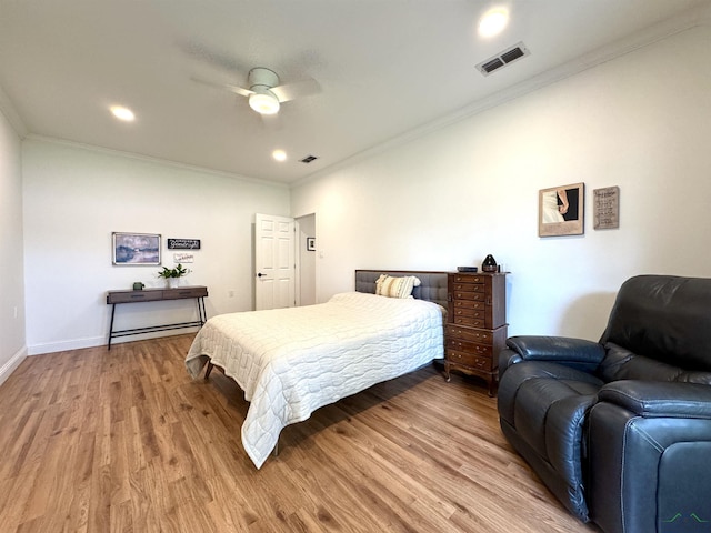 2012 W Lake Dr, Gladewater, TX 75647 - bedroom with light wood-style floors, ornamental molding, a ceiling fan, and recessed lighting