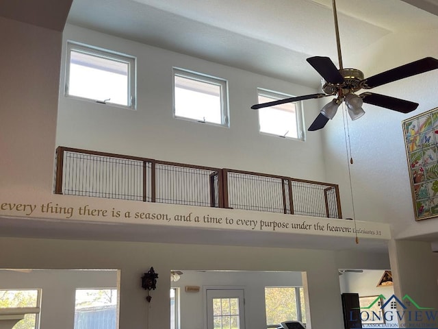 interior details featuring ceiling fan