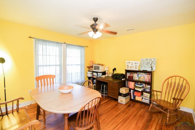 113 Fairview St, Marshall, TX 75672 - dining space with wood finished floors, ceiling fan, and baseboards