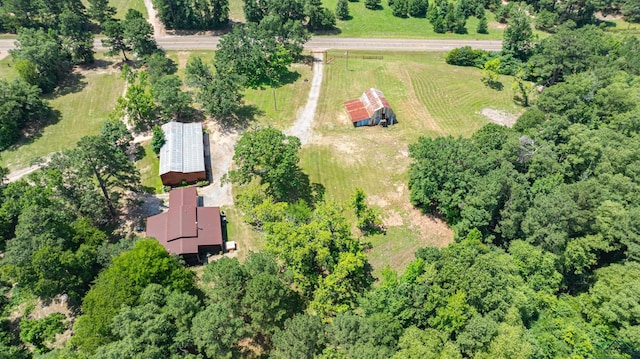 birds eye view of property featuring a rural view