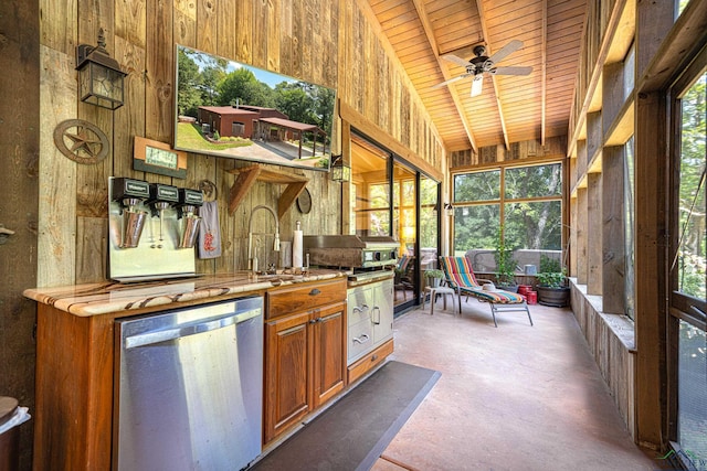 sunroom / solarium featuring vaulted ceiling, wooden ceiling, a sink, and a ceiling fan