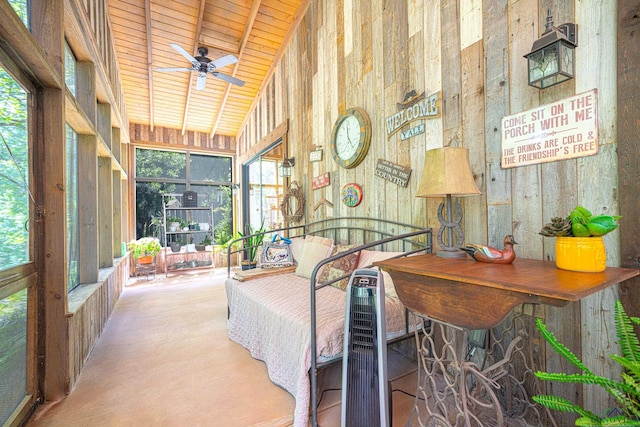 sunroom featuring ceiling fan, wood ceiling, and vaulted ceiling