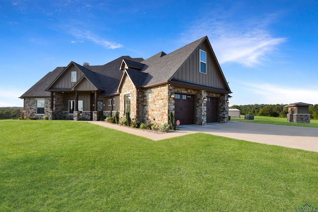 craftsman-style home featuring a garage and a front yard