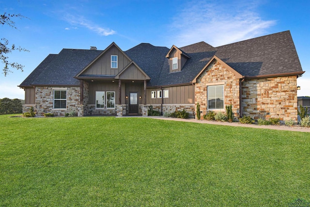 craftsman-style home with a front lawn