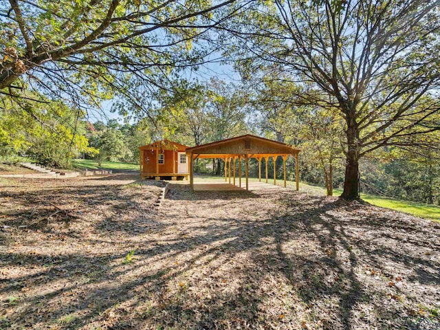 view of property's community featuring an outbuilding