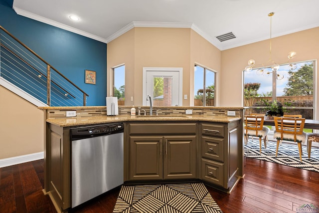 kitchen featuring light stone countertops, dishwasher, dark wood-style floors, and a sink