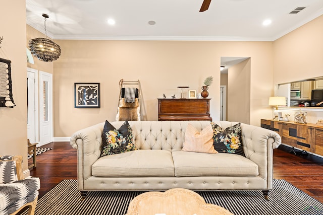 living room featuring ornamental molding, hardwood / wood-style floors, and ceiling fan