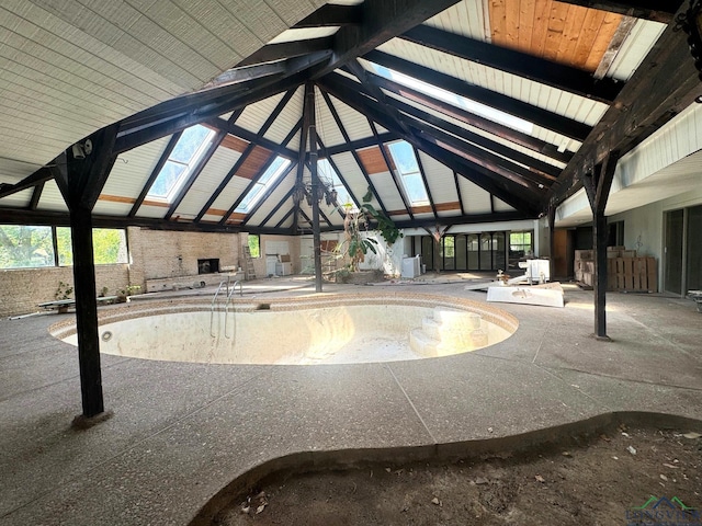 view of swimming pool with a skylight