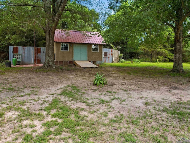 591 N Live Oak Rd, Gilmer, TX 75644 - view of yard with an outbuilding