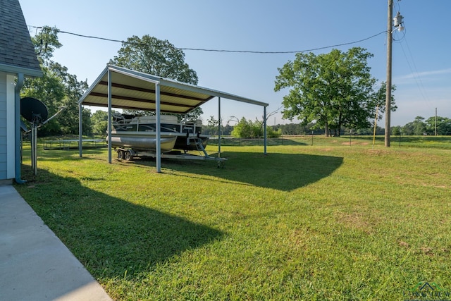 view of yard featuring a carport