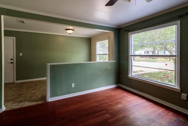 1321 Lake Dr, Longview, TX 75601 - spare room featuring a ceiling fan, wood finished floors, baseboards, and crown molding