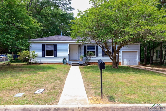 ranch-style house with driveway and a front yard