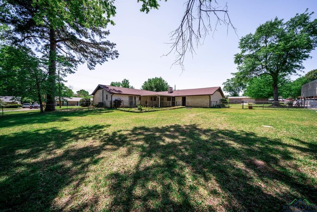 107 Tulip St, White Oak, TX 75693 - view of yard with fence