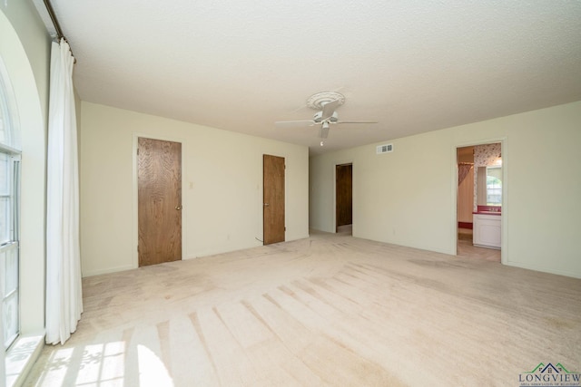 107 Tulip St, White Oak, TX 75693 - empty room with visible vents, ceiling fan, and light colored carpet