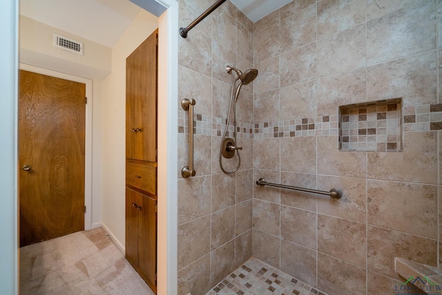 107 Tulip St, White Oak, TX 75693 - bathroom featuring visible vents and a tile shower