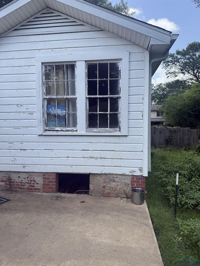 1701S Washington St, Marshall, TX 75670 - view of home's exterior featuring a patio and crawl space