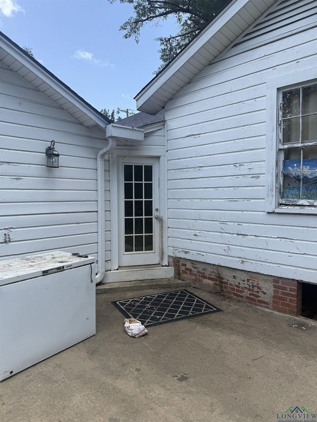1701S Washington St, Marshall, TX 75670 - view of exterior entry featuring a patio