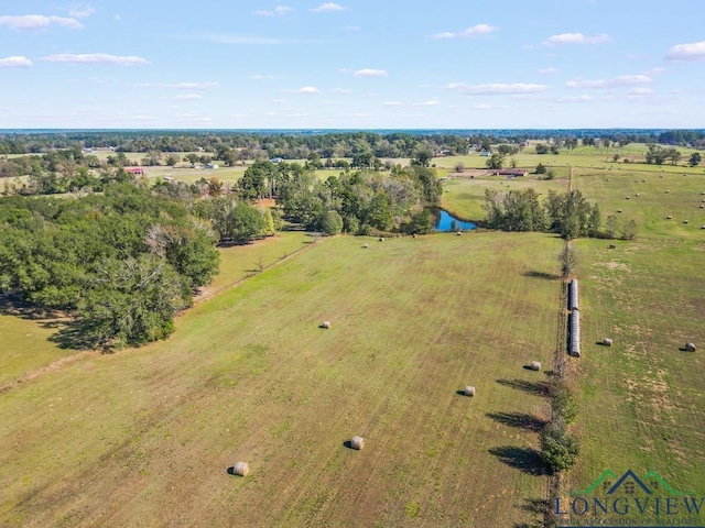 aerial view featuring a water view and a rural view