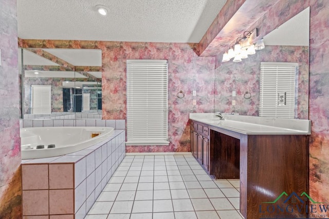 bathroom featuring vanity, a textured ceiling, an inviting chandelier, and tile patterned floors