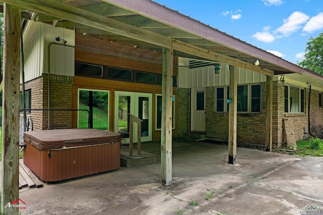 1320 Pinehill Dr, Jefferson, TX 75657 - view of patio / terrace with a hot tub