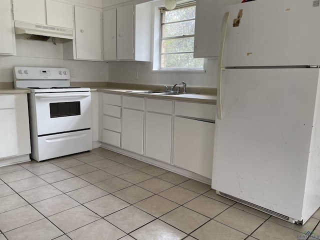 kitchen with white cabinets, white appliances, light tile patterned flooring, and sink