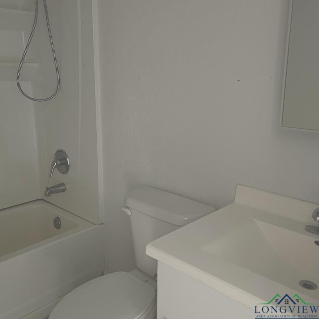 full bathroom with shower / bathing tub combination, vanity, and toilet