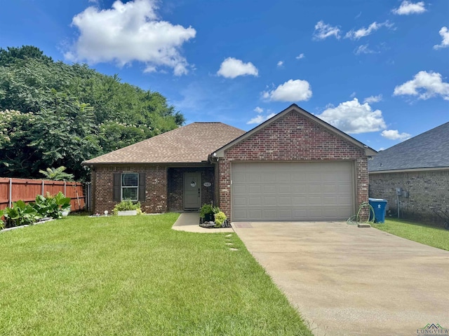 1003 E Leach St, Kilgore, TX 75662 - single story home featuring driveway, an attached garage, brick siding, and roof with shingles