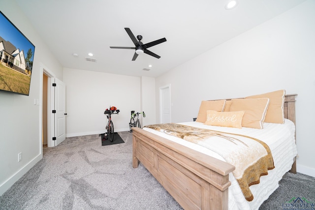 carpeted bedroom with ceiling fan