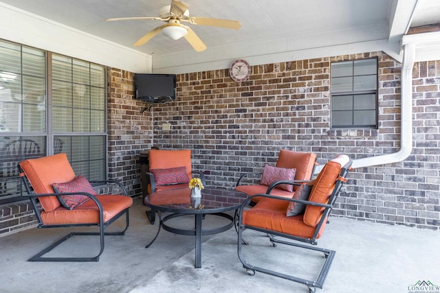 view of patio / terrace featuring ceiling fan