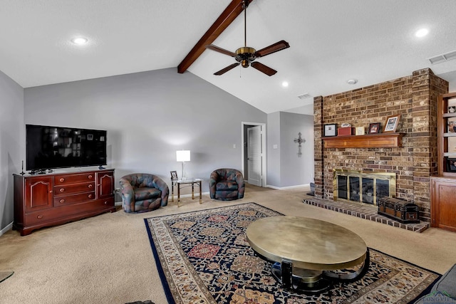 living area with light carpet, baseboards, visible vents, beamed ceiling, and a brick fireplace