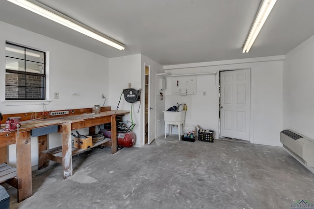 garage with a workshop area