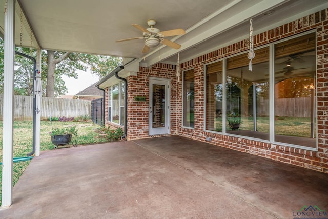 view of patio featuring ceiling fan