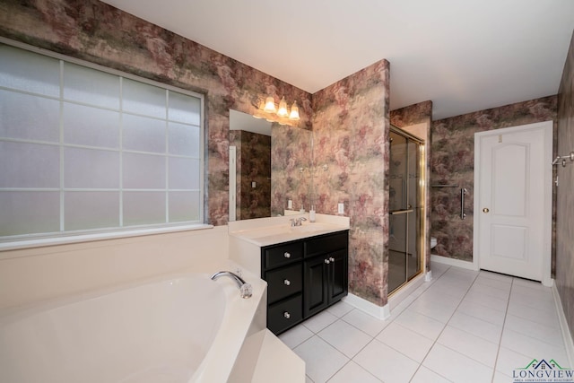 bathroom with vanity, tile patterned floors, and independent shower and bath