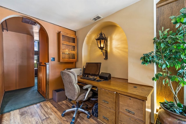 1011 Towne Lake Dr, Longview, TX 75601 - office space featuring wood finished floors and arched walkways