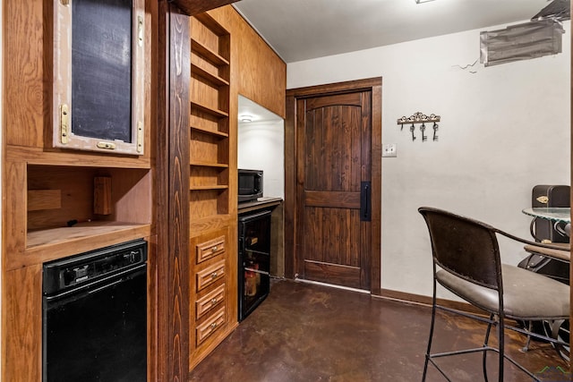1011 Towne Lake Dr, Longview, TX 75601 - home office with concrete flooring, baseboards, and beverage cooler