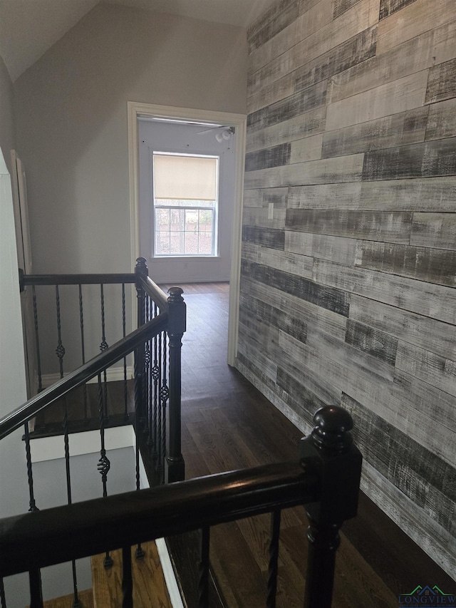 stairs featuring wood-type flooring