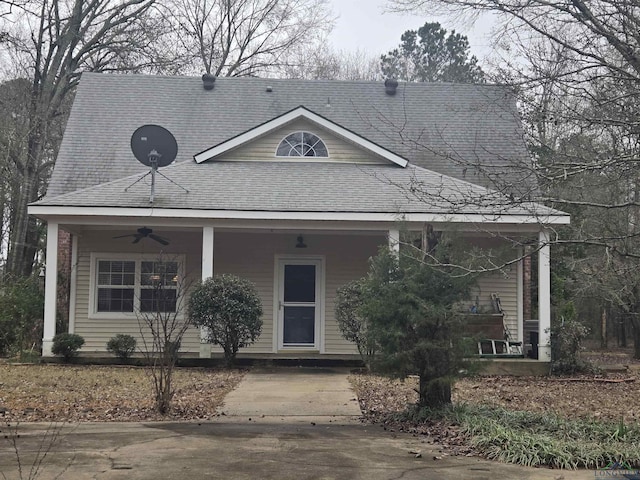 view of front of home with ceiling fan and a porch