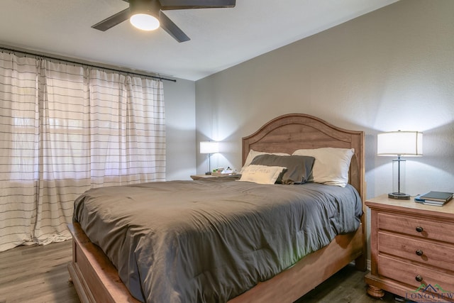 bedroom featuring ceiling fan and wood finished floors