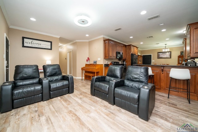 1703 Azalea St, Gilmer, TX 75644 - living room with crown molding, light wood finished floors, and recessed lighting