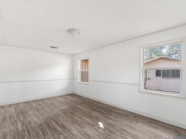 empty room featuring hardwood / wood-style floors