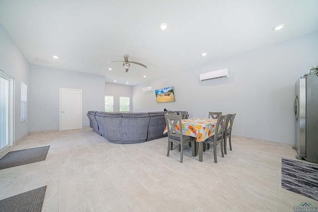 living room with a wall mounted air conditioner and ceiling fan