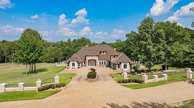 french country home with a front yard