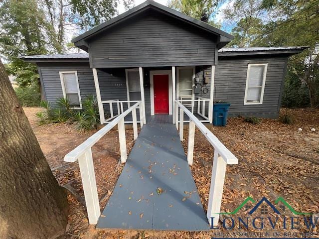 bungalow-style home with covered porch