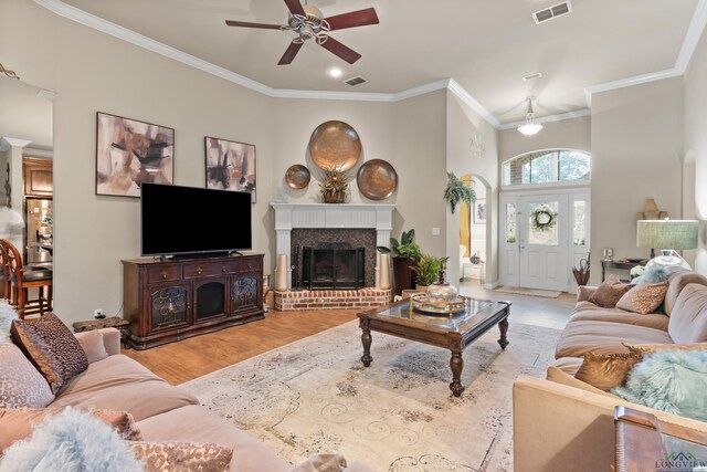 810 Crepe Myrtle Ln, Longview, TX 75604 - living room with ceiling fan, wood finished floors, crown molding, a fireplace, and recessed lighting