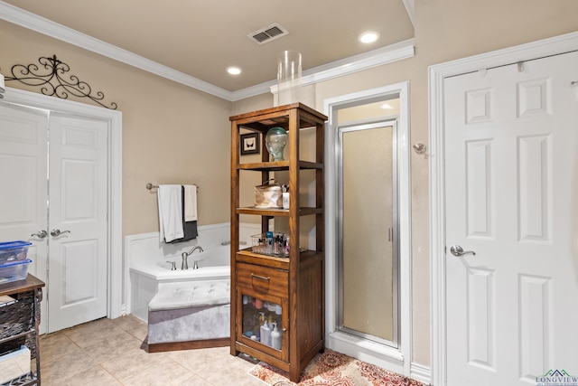 810 Crepe Myrtle Ln, Longview, TX 75604 - bathroom featuring ornamental molding, a shower stall, a garden tub, tile patterned flooring, and recessed lighting