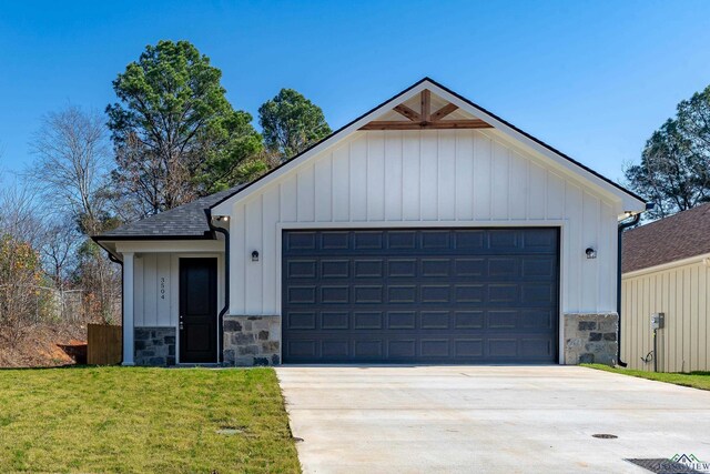 garage with a lawn