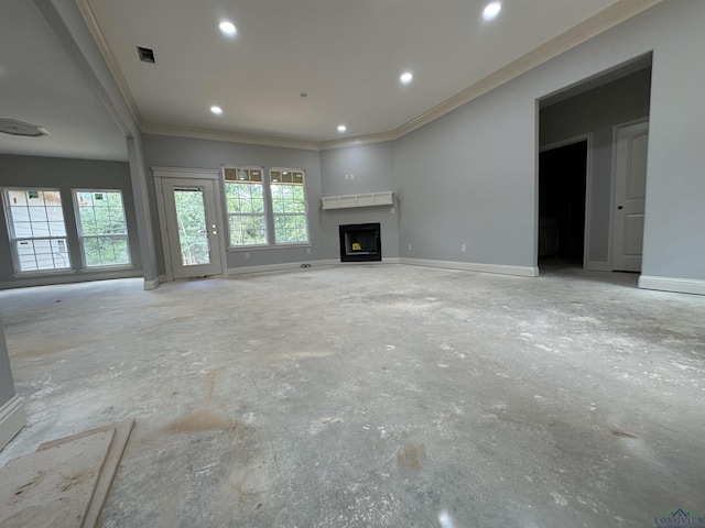 495 Lake Gladewater Rd, Gladewater, TX 75647 - unfurnished living room with ornamental molding, a fireplace, recessed lighting, and concrete flooring