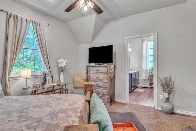 204 Hurley Ave, Gladewater, TX 75647 - carpeted bedroom with multiple windows, baseboards, and lofted ceiling