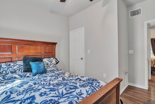204 Hurley Ave, Gladewater, TX 75647 - bedroom with visible vents, baseboards, ceiling fan, and wood finished floors